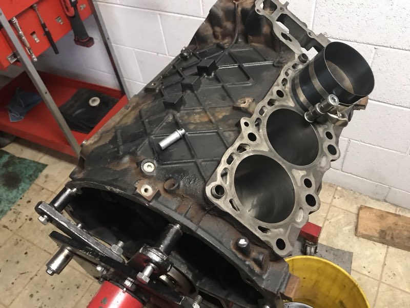 Bare engine block on the stand for a rebuild